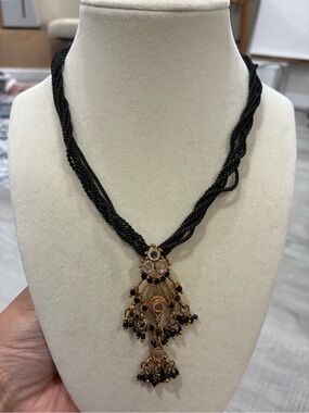 Gold and Black Beaded Pendant Necklace